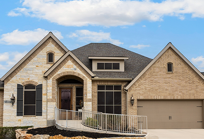 A stone home on a sunny day