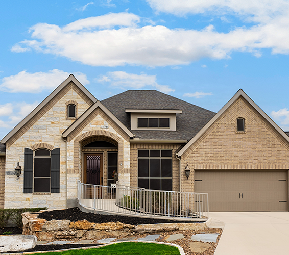 A stone home on a sunny day