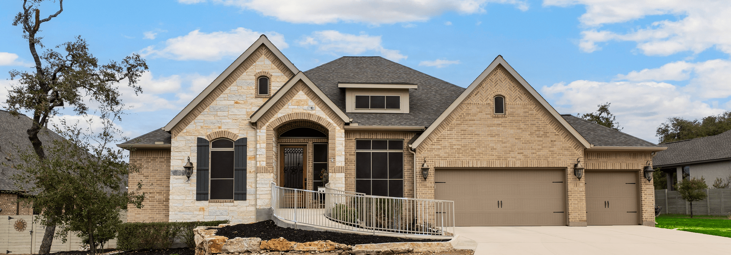 A stone home on a sunny day